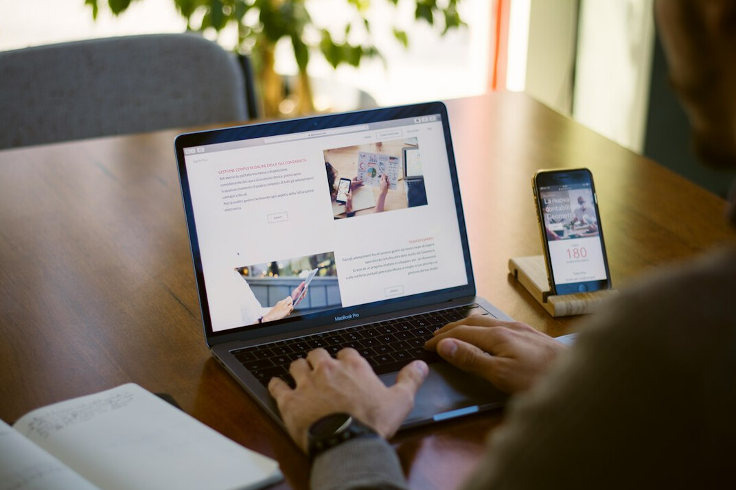 person working on laptop sustainably